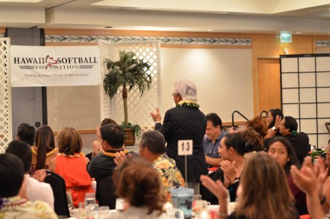 Ron Komine Sr. gives Herbert Paleka Jr. a standing ovation